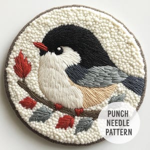 May include: Punch needle pattern featuring a white bird with black head and gray wings perched on a branch with red and gray leaves. The background is white with a brown border. The text "Punch Needle Pattern" is in the lower right corner.