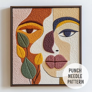 Peut inclure: Modèle de broderie au poinçon représentant deux visages abstraits avec un motif floral. Les visages sont composés de formes et de textures de différentes couleurs, notamment le brun, l'orange, le jaune, le rose, le violet et le bleu. Le motif floral est composé de feuilles vertes et de fleurs jaunes. Le modèle est intitulé "Punch Needle Pattern".