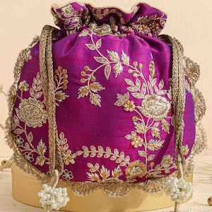 Purple embroidered scallop potli bag