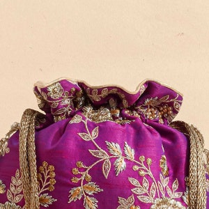 Purple embroidered scallop potli bag