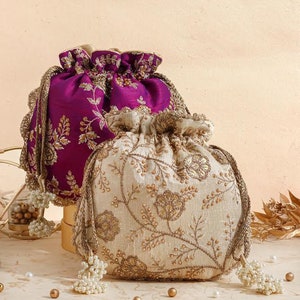 Purple embroidered scallop potli bag