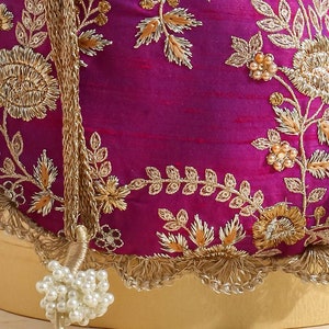 Purple embroidered scallop potli bag