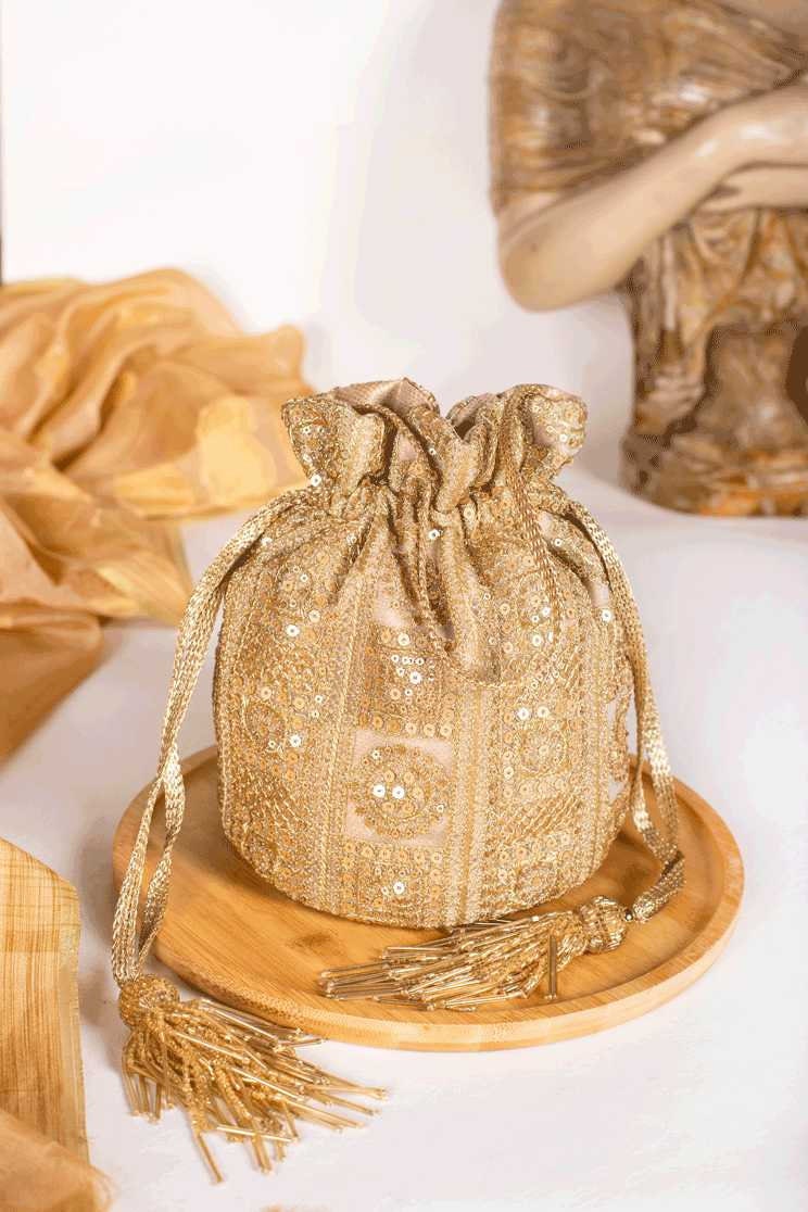 Golden potli bags online sale