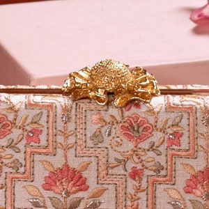 AMYRA Mogra Capsule Clutch