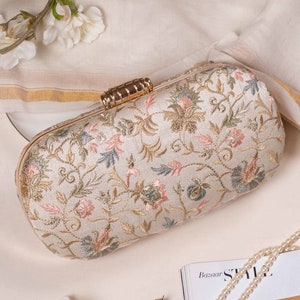 AMYRA Eden Capsule Clutch