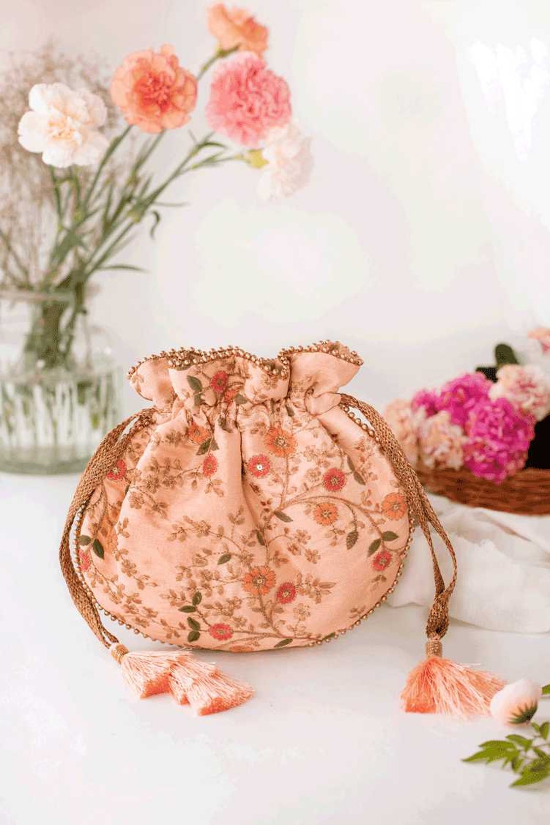 Shop Amyra Women Onion Pink Silk Potli for Women Online 39600488