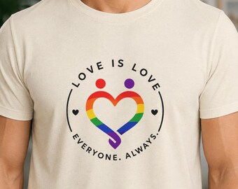 Camiseta Unissex "Love Is Love" com Estampa de Coração Arco-Íris LGBTQ+, Camiseta de Igualdade e Inclusão, Presente para o Orgulho Gay, Roupa Unissex do Orgulho, Camiseta LGBT
