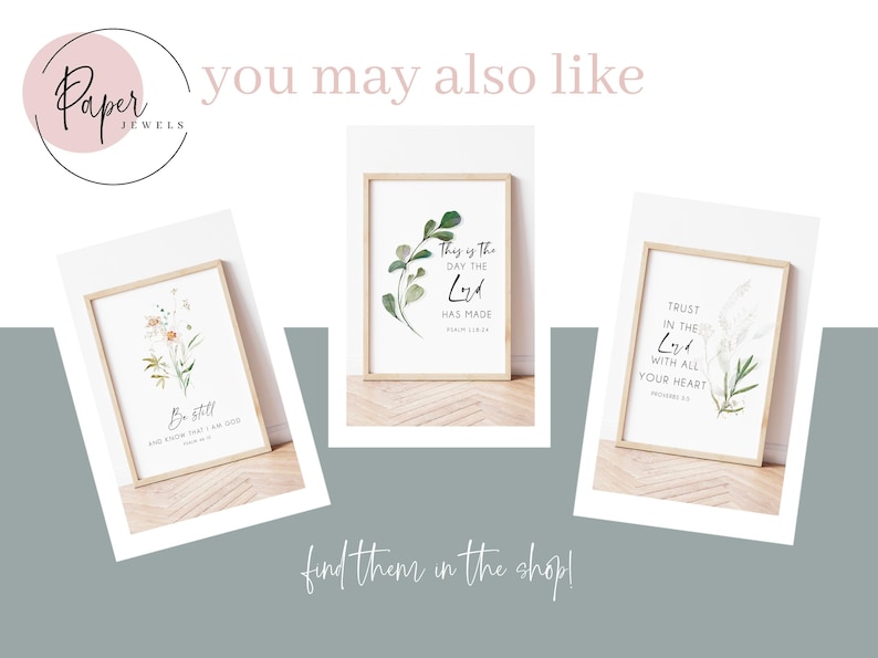 May include: Three framed art prints with inspirational quotes and botanical illustrations. The prints are in light wood frames and feature phrases like "Be Still" and "Trust in the Lord." The overall aesthetic is minimalist and calming.