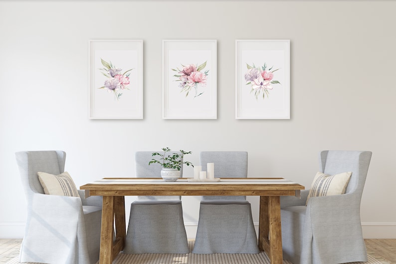 A set of three framed watercolor floral prints featuring pink and purple peonies with green leaves arranged in a minimalistic and elegant style against a white background. Pink peonies set of three prints, floral print set of 3, pink green botanical bouquet art, large poster, bathroom art hallway art, wall art