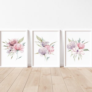 A set of three framed watercolor floral prints featuring pink and purple peonies with green leaves arranged in a minimalistic and elegant style against a white background. Pink peonies set of three prints, floral print set of 3, pink green botanical bouquet art, large poster, bathroom art hallway art, wall art