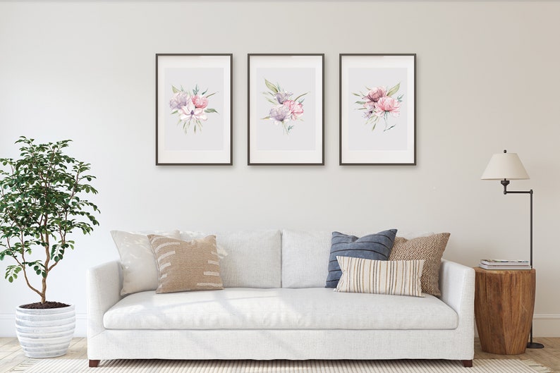 A set of three framed watercolor floral prints featuring pink and purple peonies with green leaves arranged in a minimalistic and elegant style against a white background. Pink peonies set of three prints, floral print set of 3, pink green botanical bouquet art, large poster, bathroom art hallway art, wall art