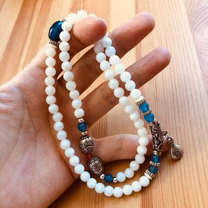 Beaded necklace bracelet with Giant Clam Shell and Sterling Silver Charms