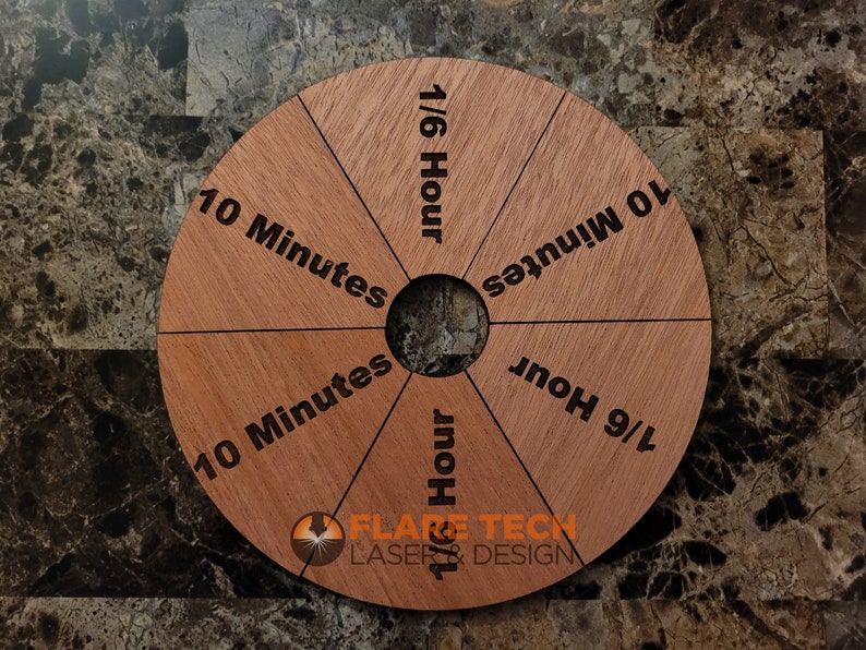 Peut inclure: Une roue de gestion du temps en bois avec six sections. Chaque section est &eacute;tiquet&eacute;e avec un incr&eacute;ment de temps&nbsp;: 10&nbsp;minutes, 1/6&nbsp;heure, 10&nbsp;minutes, 1/6&nbsp;heure, 10&nbsp;minutes et 1/6&nbsp;heure. La roue est fabriqu&eacute;e par Flare Tech Laser & Design.