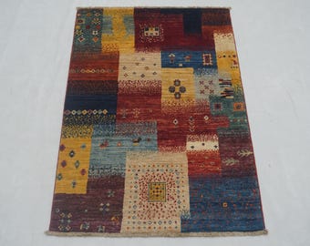 Hand Knotted Wool Gabbeh Rug: Multicolor Tribal Accent Rug (2'7"x4')