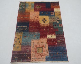 Hand Knotted Wool Gabbeh Rug: Multicolor Tribal Accent Rug (2'7"x4'1")