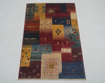 Hand Knotted Wool Gabbeh Rug: Multicolor Tribal Accent Rug (2'8"x4'1")