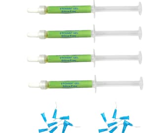 May include: Four green and white labeled syringes filled with a yellow liquid. The labels read "Etchant Gel Silica-Free".  Two groups of blue plastic applicators are scattered below the syringes.