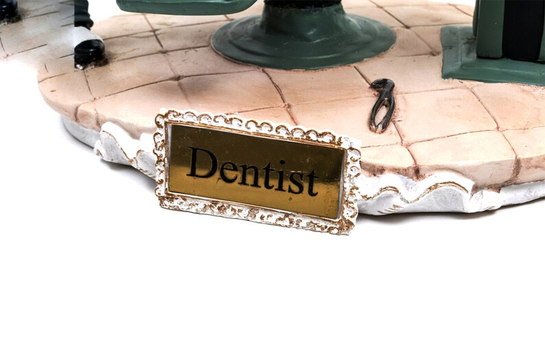 Brunette Female Dentist Figurine – Vintage-Style Statue Performing Tooth Extraction
