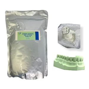 May include: A bag of Green Dental Die Stone Type-IV dental plaster, a scoop of the powder in a plastic bag, and a green dental model of teeth.