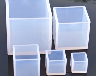 May include: Four clear silicone molds in different sizes, perfect for making square resin crafts. The molds are made of flexible silicone and are easy to use.