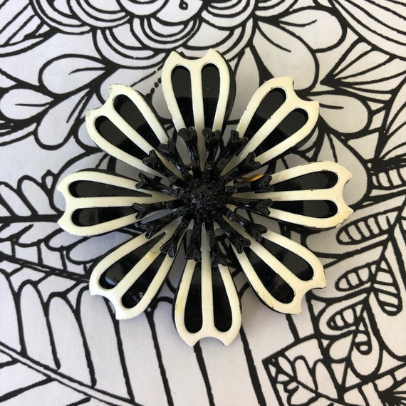 Large black White 1960’s enamel flower brooch, flo