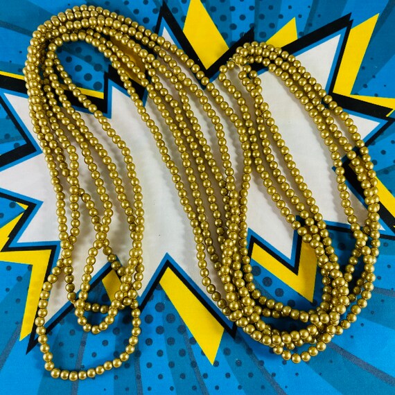 3 Strands of stunning golden glass seed beads neck