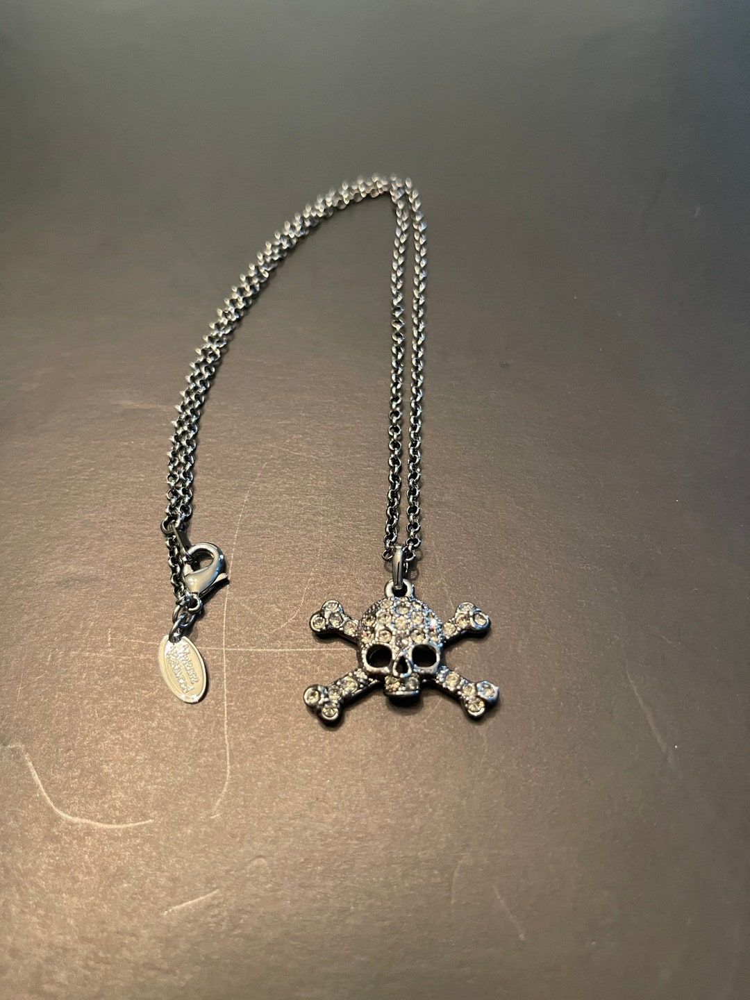 Vivienne westwood blue skull necklace deals