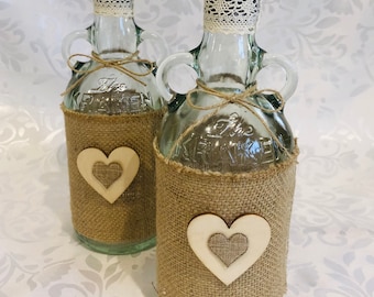 10 x Kraken rum bottles, decorated in a rustic theme, perfect for wedding centerpieces