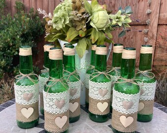 Stella Artois rustic bottles for wedding centrepieces, rustic bottles