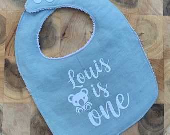 Personalised first birthday round shape linen baby bib keepsake gift idea