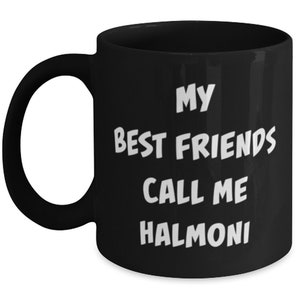 May include: Black coffee mug with white text that reads "My best friends call me Halmoni".