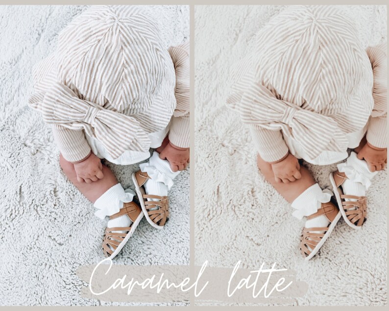 May include: A baby wearing a striped hat and matching outfit, sitting on a white fluffy rug. The baby is wearing white socks with ruffles and brown sandals.