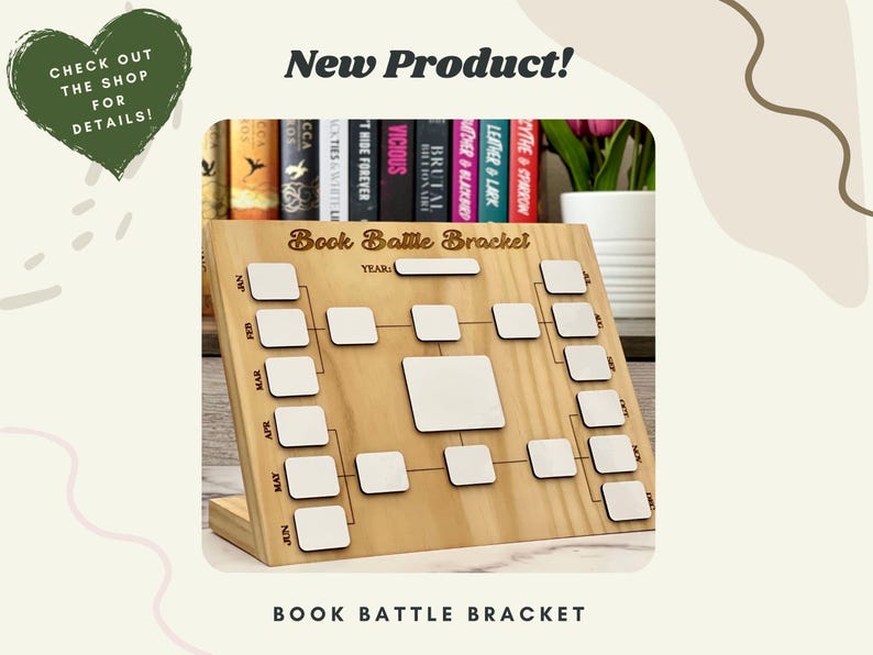 May include: A wooden "Book Battle Bracket" with a tournament layout. It features spaces for book titles and a "YEAR" section. The image also includes the text "New Product!" and "CHECK OUT THE SHOP FOR DETAILS!"