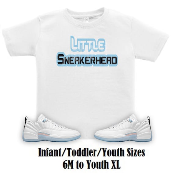 Baby blue and white jordan shirt cheap