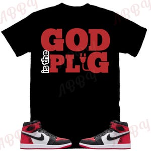 God is the Plug Shirt to Match Jordan 1 Ruby, Retro 1 Ruby Shirt, Ruby 1s Sneaker Tee