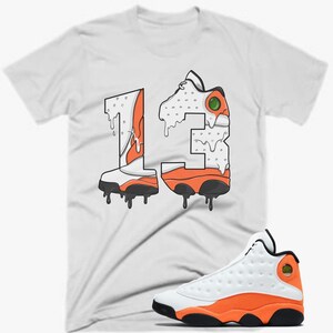Orange jordan cheap 13