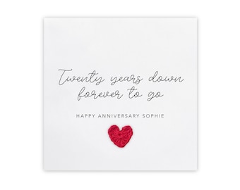 May include: A white card with the text "Twenty years down forever to go" and "Happy Anniversary Sophie". A small red heart is embroidered below the text.