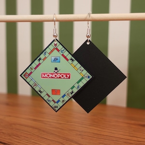 Orecchini pendenti del gioco da tavolo Monopoly