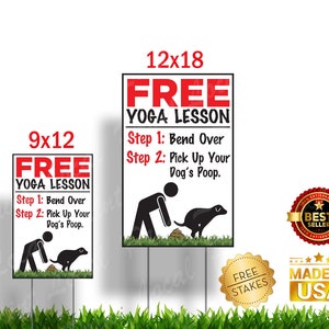 May include: Two red and white yard signs with the text "FREE YOGA LESSON" and instructions to "Bend Over" and "Pick Up Your Dog's Poop". The signs are 9x12 inches and 12x18 inches. The signs are on green grass.