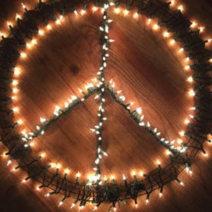 Made to order PEACE SIGN wreath indoor outdoor decor metal frame with 200 string lights. 24" diameter