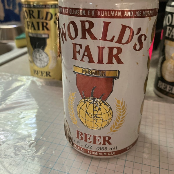 One vintage world‘s fair beer flip tab full beer aluminum can 1984 White can