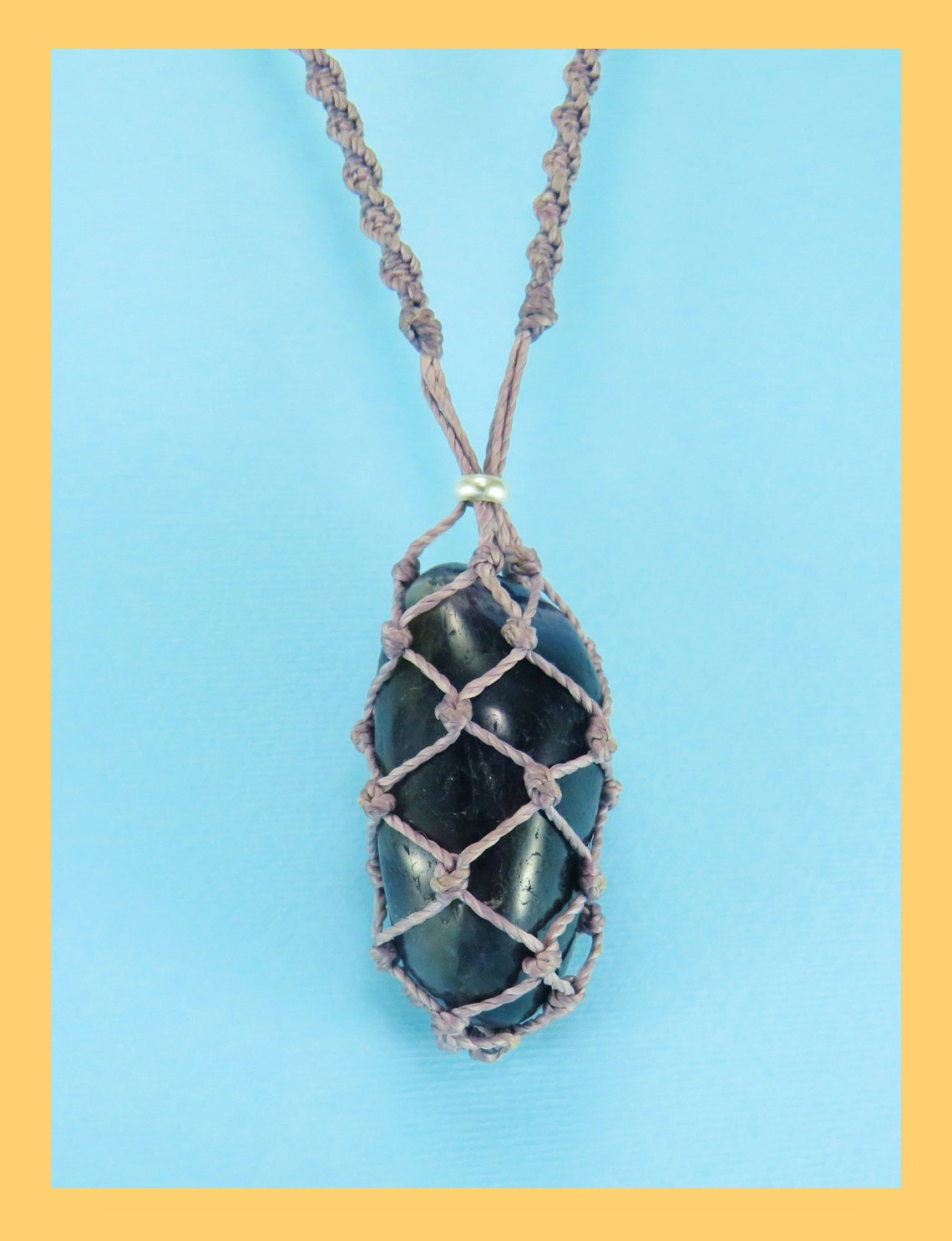 A trendy macramé interchangeable crystal cage necklace with Etsy