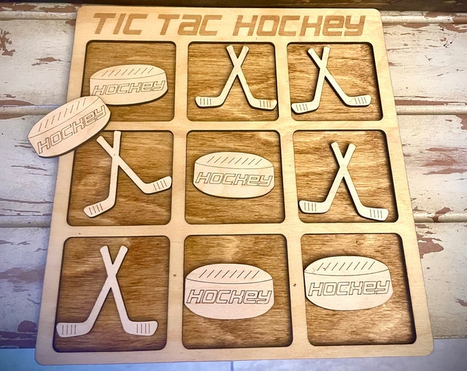 Hockey game - Tic Tac Hockey.  Laser engraved and cut wood hockey game available in 12 finishes.  Great hockey gift, birthday gift