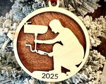 Plumber 2 layer personalized laser cut wood Christmas ornament, gift tag available in 12 finishes.
