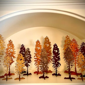 Intricate lodgepole pine tree wooden tabletop decor available in 3 styles, 5 sizes and 12 finishes  Great 3D effect.