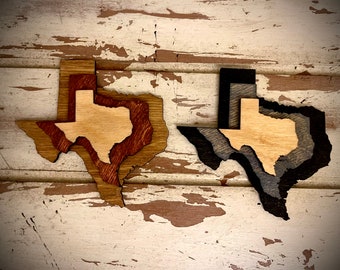Texas 3-layer stacked state laser cut wood magnet available in brown tones or gray tones.