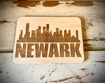 Magnet - Newark Skyline cityscape. 3.5" X 2.5" wood magnet.  Great souvenir or memento from your favorite city.