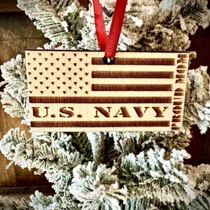 US Navy Proud Mom laser engraved US flag ornament.  1/4 inch wood.  4 inches X 2.1 inches.  Great gift to show pride!