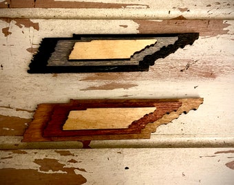 Tennessee 3-layer stacked state wood magnet available in brown tones or gray tones.