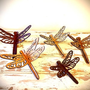 Intricate dragonfly wooden tabletop decor available in 5 sizes and 12 finishes  Great 3D effect.  Wedding centerpiece
